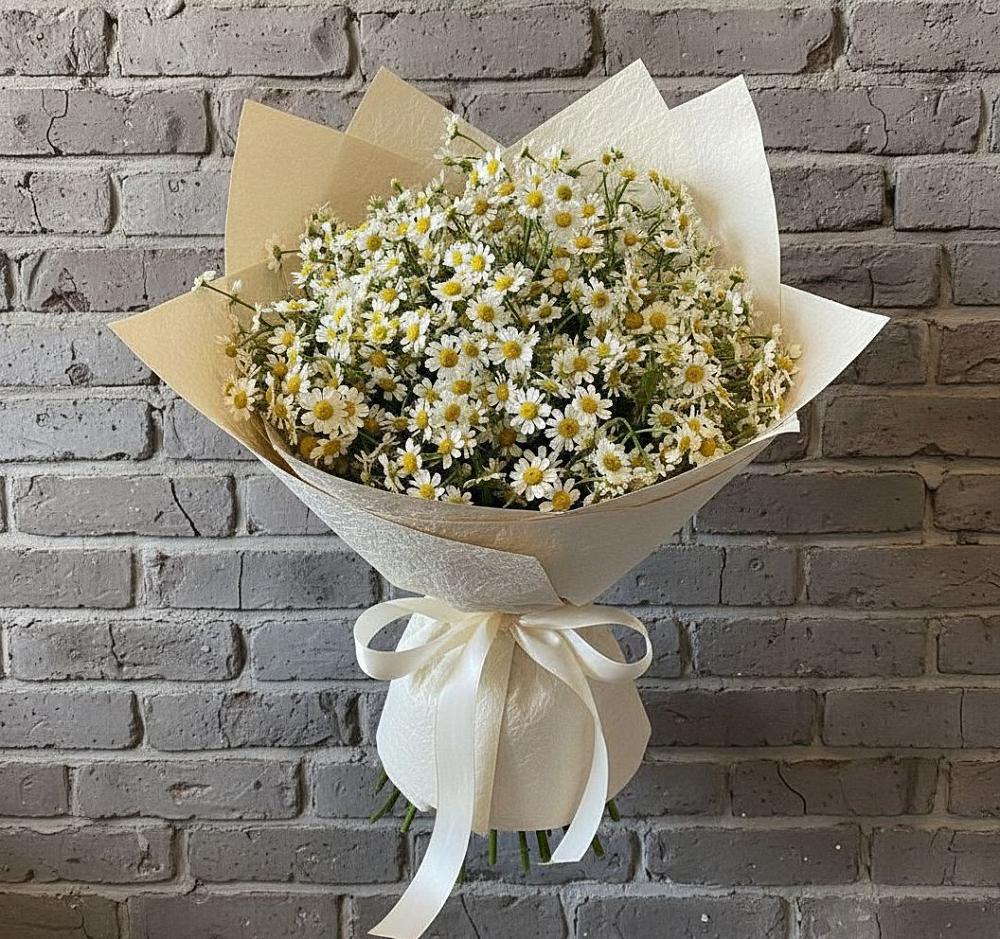 Букет цветов из: Ромашки в Красном